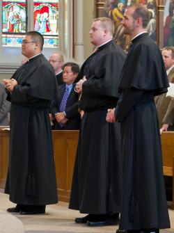 Holy Cross Celebrates Final Vows of Three Men