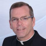 Fr. Looney is Director of Campus Ministry at King