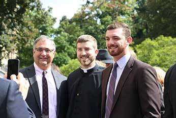 Fr Matt Fase, CSC pictured with his family