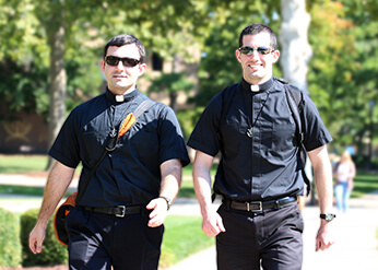 Ryan Pietrocarlo, CSC And Mike Palmer, CSC Walking Across Campus