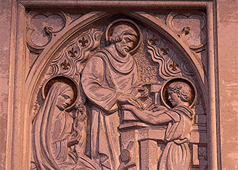 The image of the Holy Family above the tomb